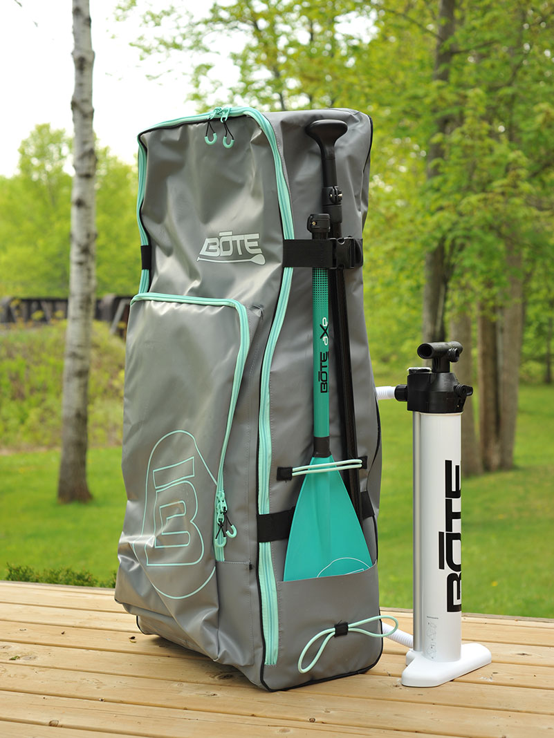 The BOTE Rackham Aero 12'4" inflatable SUP packed in its travel bag with pump