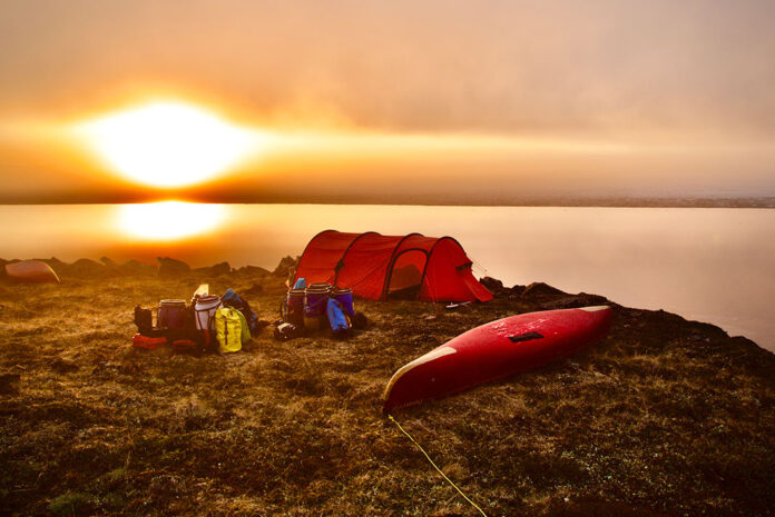Expedition AKOR's campsite at dusk on their cross-continent trip across Canada