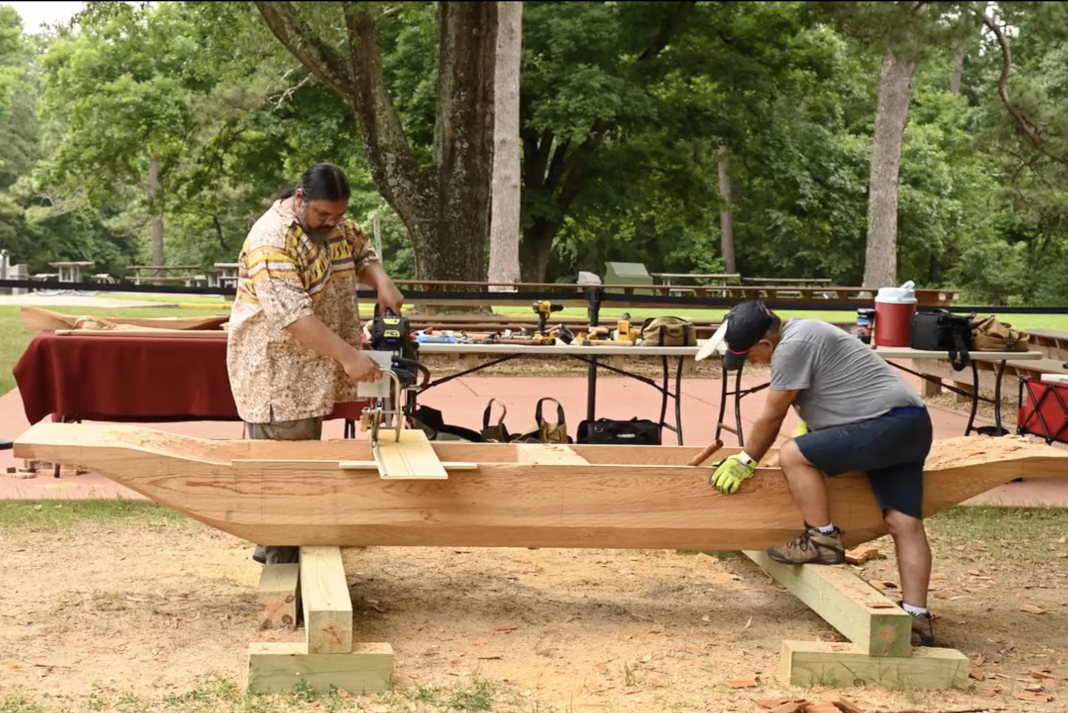 Building a dugout canoe
