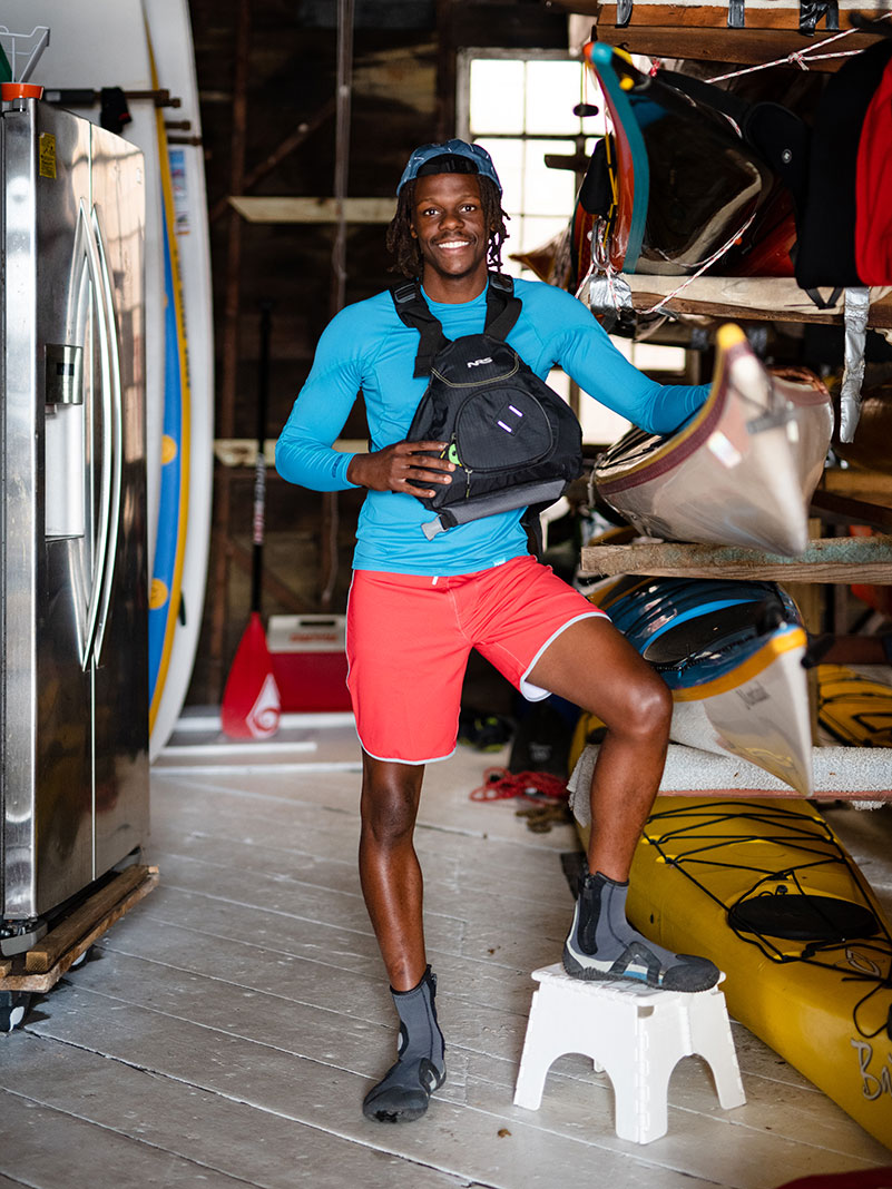 Chev Dixon stands inside Yonkers Paddling & Rowing Club in New York statea 