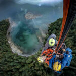 3 Backcountry Blunders That Will Get You In Real Trouble backcountry paddlers are pulled up to a helicopter after a mistake leads to rescue