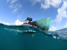 Below water view of person on fishing kayak
