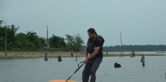 Using flip line to right kayak