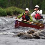 Boat Review: Nova Craft Prospector 17 TuffStuff Expedition Happy canoeists on river