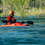 Ultimate Guide To Dagger Kayaks man paddles a Dagger kayak