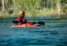Ultimate Guide To Dagger Kayaks man paddles a Dagger kayak