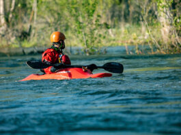 man paddles a Dagger kayak