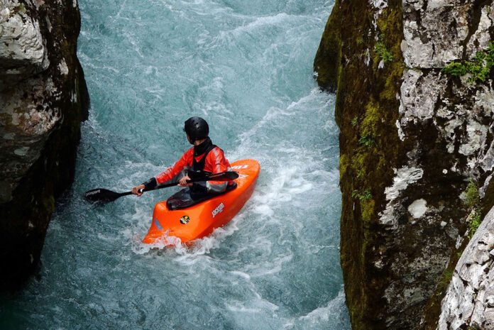 whitewater paddler in a Jackson Kayak