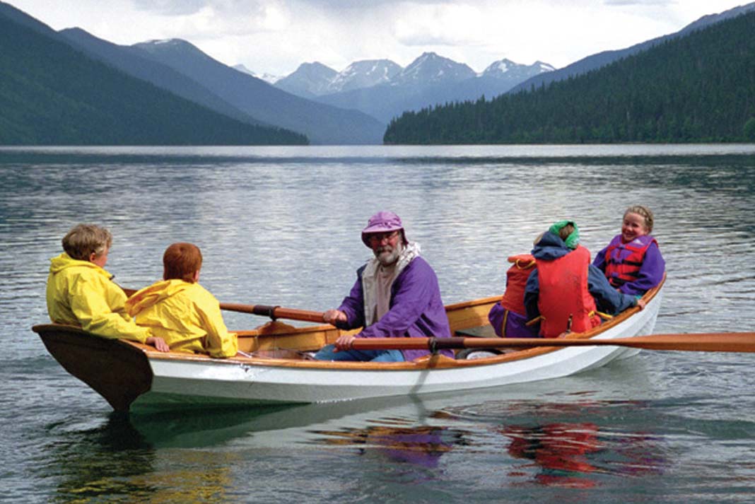 JOHN LOCKWOOD ROWING WITH FREYA (BOW) AND FRIENDS, BOWRON LAKES, 1995. "SUCH EXPERIENCES ON THE WILD EARTH ARE THE BEST I HAVE TO GIVE MY CHILD."| PHOTOS: COURTESY PYGMY BOATS ARCHIVE AND FENNWOOD PHOTOGRAPHY