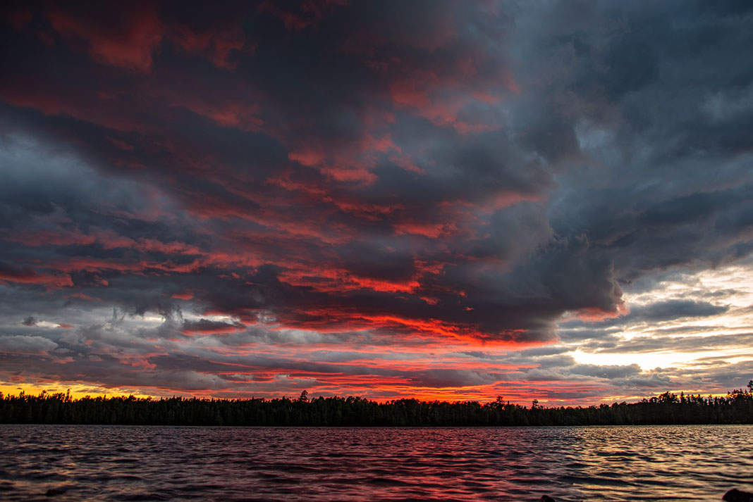 dramatic lighting on clouds at sunset in Boundary Waters