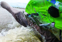 Kayak angler flips in cold water