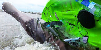 Kayak angler flips in cold water