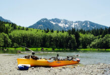 Hobie fishing kayak on a riverbank