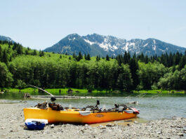 Hobie fishing kayak on a riverbank
