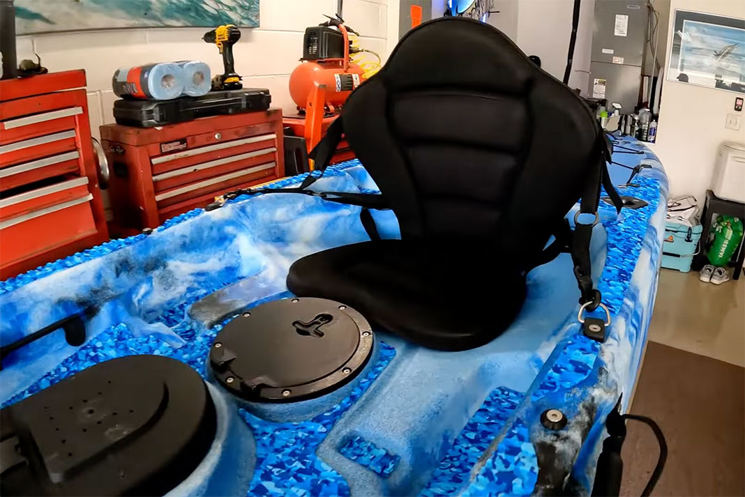 blue sit-on-top kayak with sit-inside seat added for offshore fishing