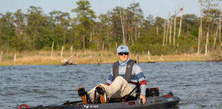 man pedals the Vibe Shearwater 125 fishing kayak