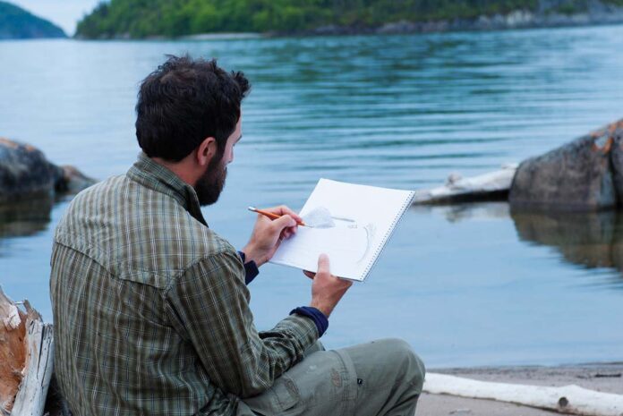 The Lake Superior landscape at Jackfish inspires assistant guide, Otto Bedard, nearly a century after these same silent hills and moody waters captivated the Group of Seven