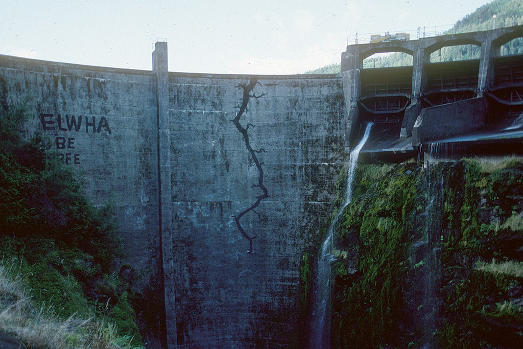 graffiti on the Glines Canyon Dam advocating for the dam's removal