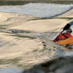 10 Expert Sea Kayaking Tips That Could Save Your Life sea kayaker paddles in waves