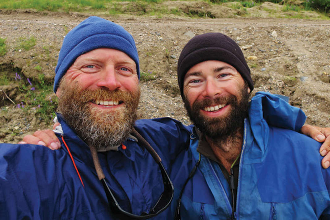 Frank Wolf and Rob Hart pose on their canoe expedition
