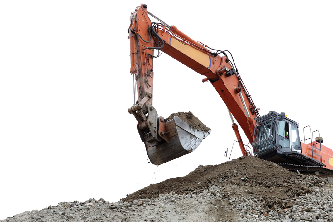 A caterpillar moves earth at the site of a dam removal