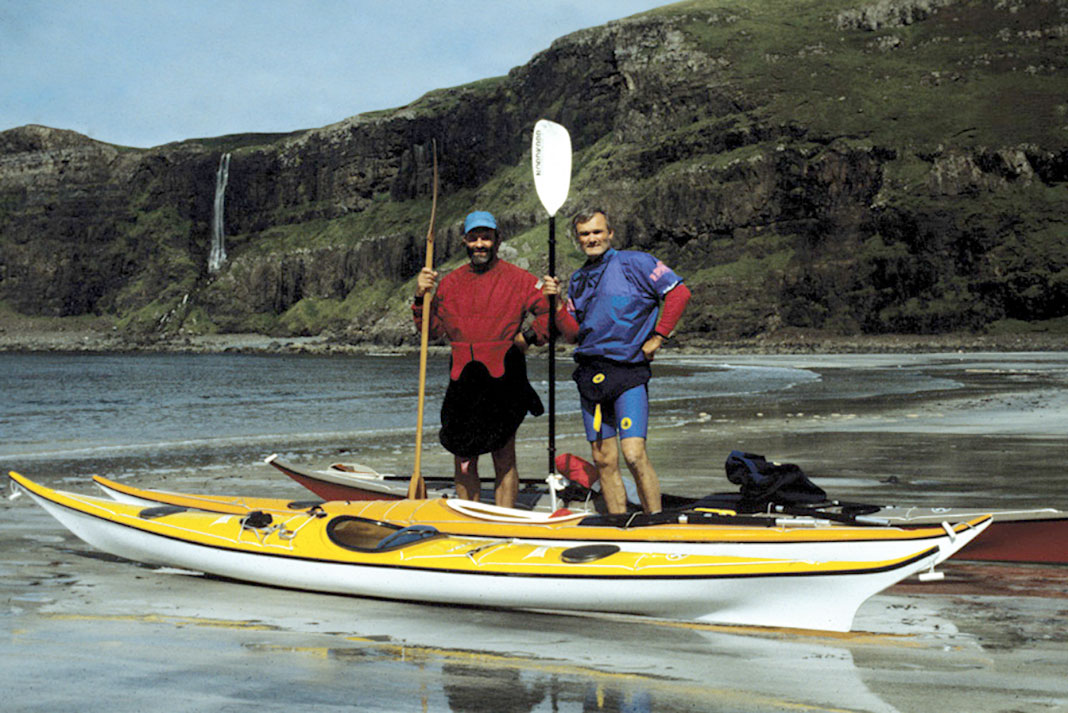Frank Goodman and Stan Chladek pose with their Nordkapp sea kayaks in Tallisker Bay, Isle of Skye