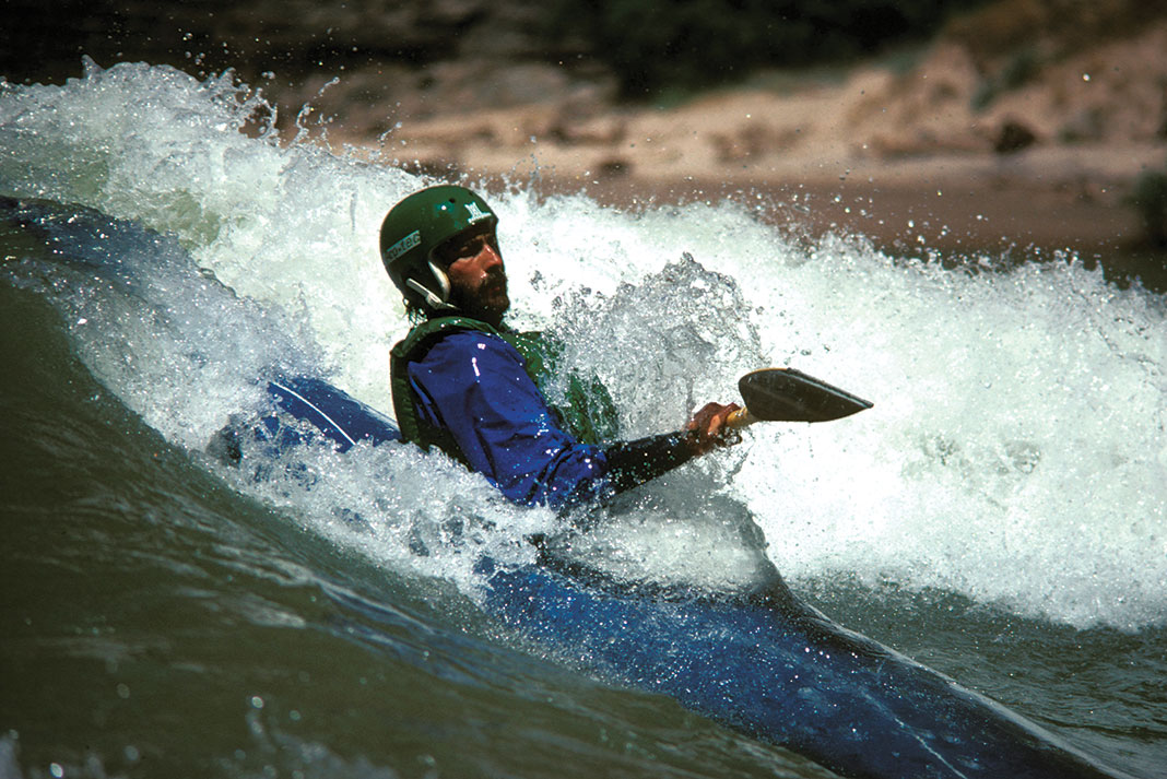 John Wasson carves a Grand Canyon wave in his Perception Mirage