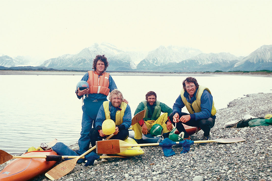Don Banducci, Rob Lesser, John Wasson and Bo Shelby show off their Blue Puma jackets, Pro-Tec lids and 90-degree Mitchell sticks after the first descent of the Alsek River, 1980