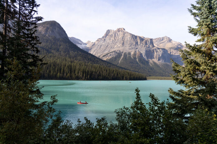 people canoeing on Mountain Lake near Golden, BC