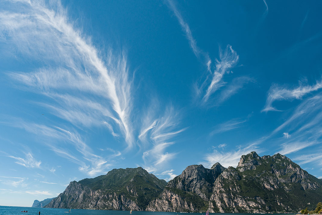 cirrus clouds over a seaside mountain