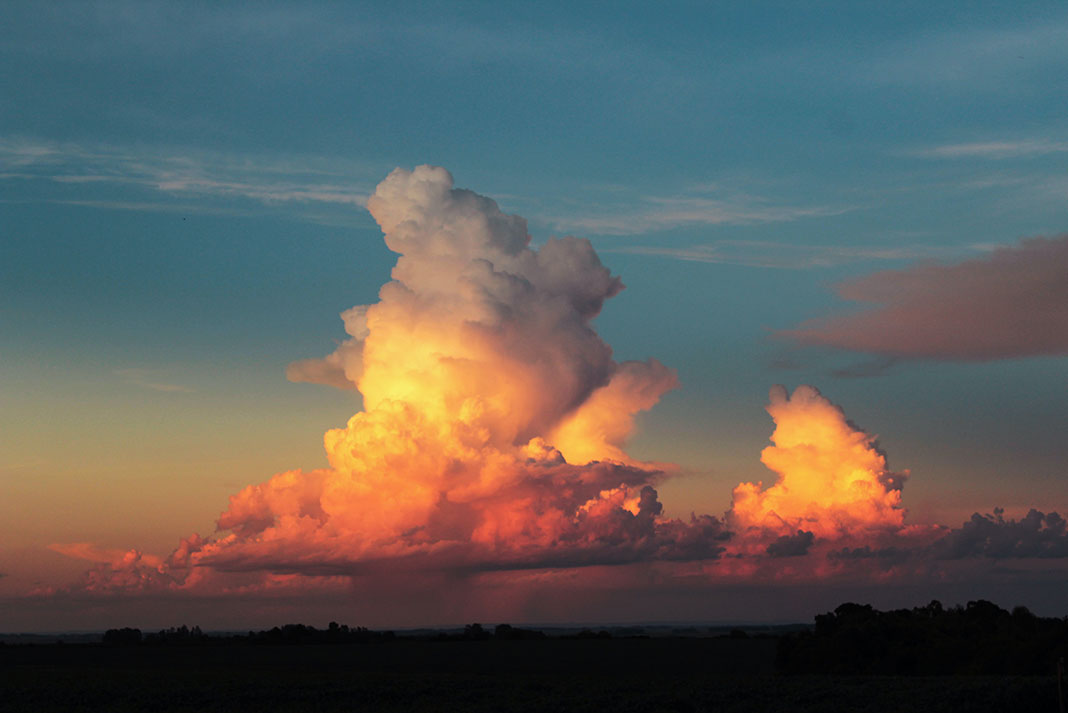 cumulonimbus clouds at sunset