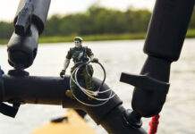 a plastic para-trooper toy is one kayak angler's fishing lucky charm