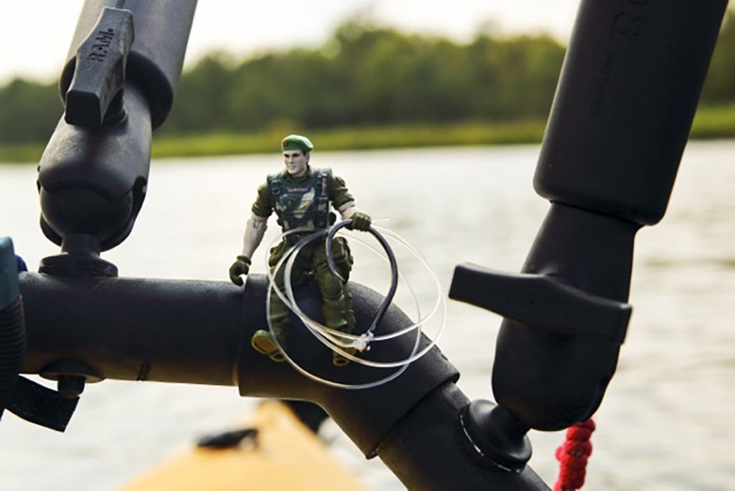a plastic para-trooper toy is one kayak angler's fishing lucky charm