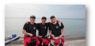 Jeff Guy, Kwin Morris and Joe Lorenz on the shores of Lake Ontario by Fort Niagara after 35 mile 13 hour paddle from Toronto on Friday June 9, 2023