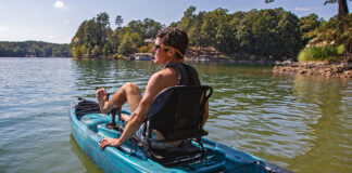 man pedals a pedal kayak from Perception