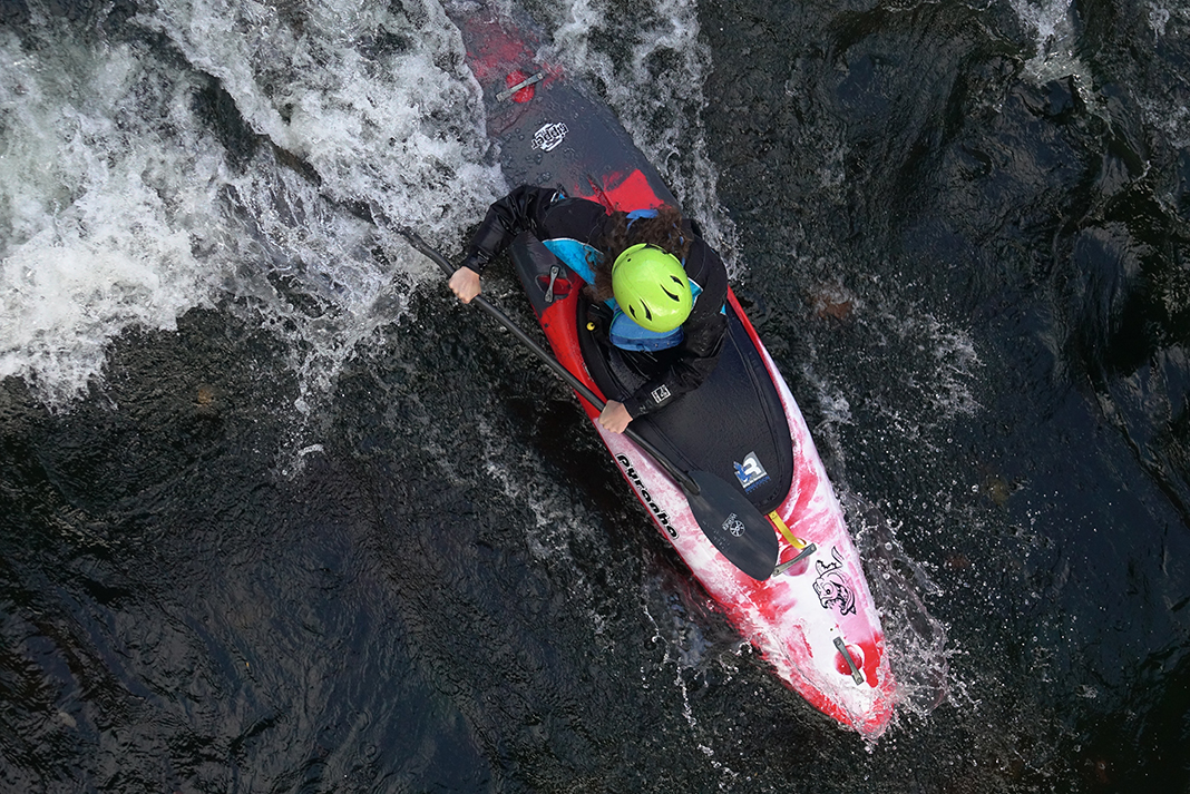 overhead photo of person paddling a river kayak from Pyranha
