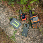 4 Best Two-Way Satellite Communicators For Off-Grid Adventures four satellite communicators sit on a rock