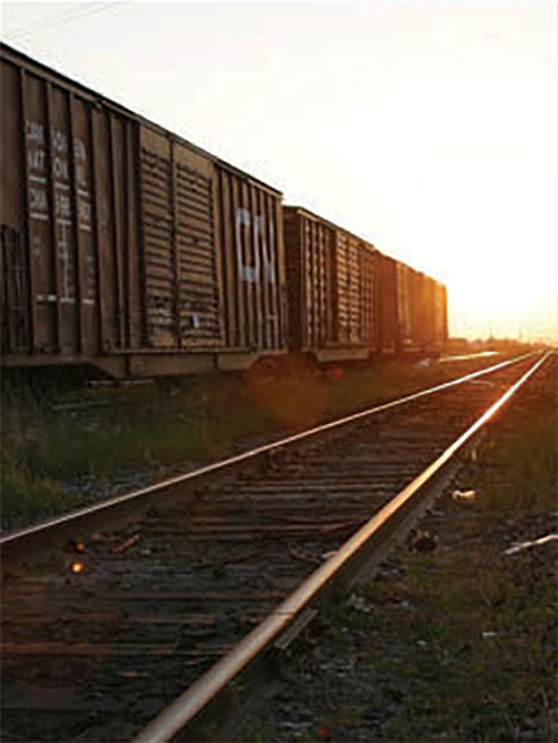 Railway tracks and freight train in Hearst