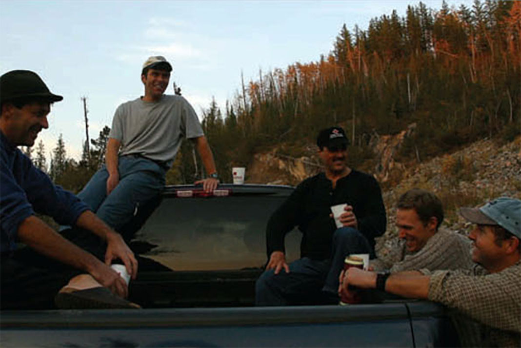 a group of men tailgaiting after whitewater paddling on Skunk Creek