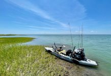 fishing kayak sits on the banks of the Chesapeake Bay during John Hostalka's birthday tour