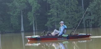 man sits and pedals the Jackson Knarr FD 2023 fishing kayak