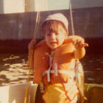 Learn, Grow, Teach: How To Become A Complete Angler A young Chris Funk holds up his first fish on the path to becoming a complete angler