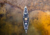 An image of a fishing kayak viewed from above