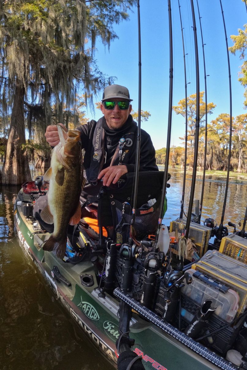 Angler Casey Reed with bass.