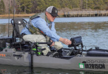 Best Kayak Fish Finders For 2026 Editor Ric Burnley using the fish finder on his kayak.