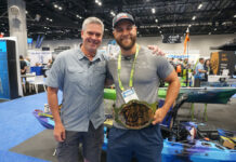 Kayak Angler's Keith Stevenson poses with inaugural YakOff Awards winner Jake Suvak as he receives his championship belt