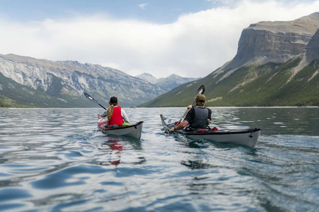 Canadian Olympic paddler Haley Daniels and her brother Hayden paddling TRAK 2.0 kayaks.