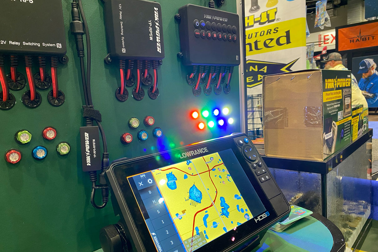 a display of Lowrance fish finder with YakPower electronics systems at ICAST 2025