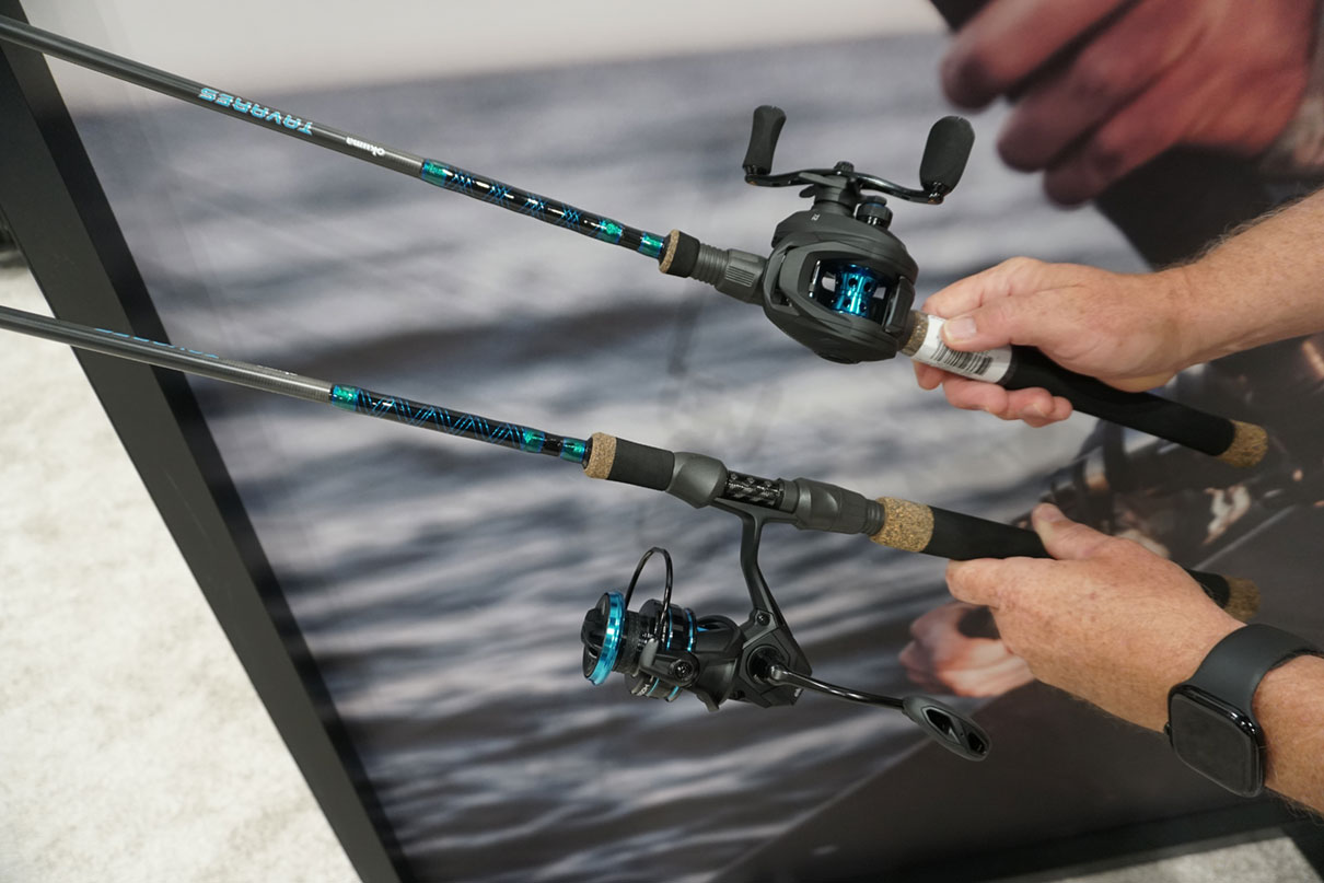 a person holds two Okuma combos at ICAST 2025