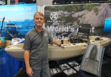 Ric Burnley poses in front of the FluxJet jet-powered kayak at ICAST 2025